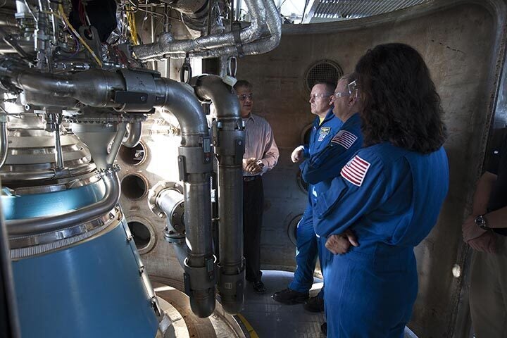 Astronauts speak with an engineer about the RL10 engine