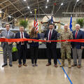 Representatives cut ribbon on a facility in Waco, Texas