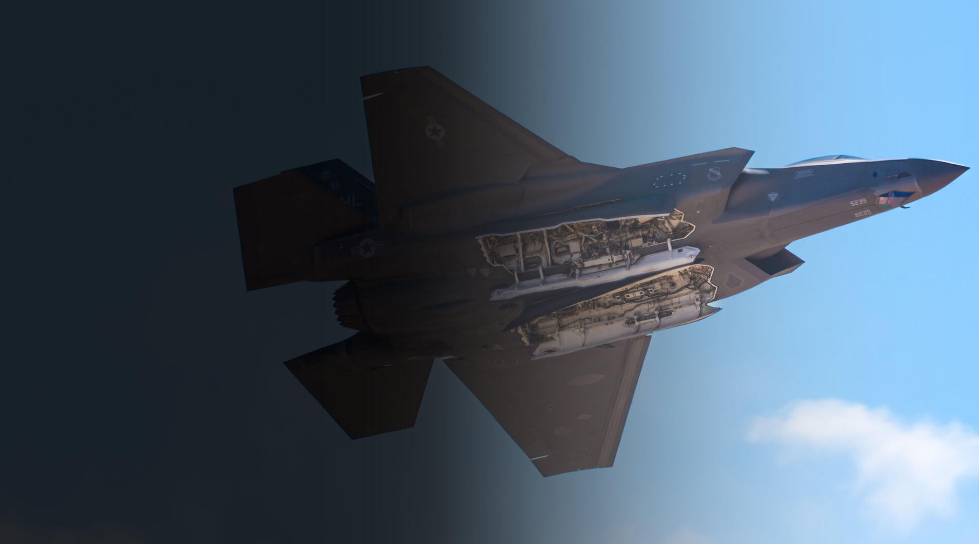 A U.S. Air Force F-35A Lightning II aircraft performs a weapons bay door pass