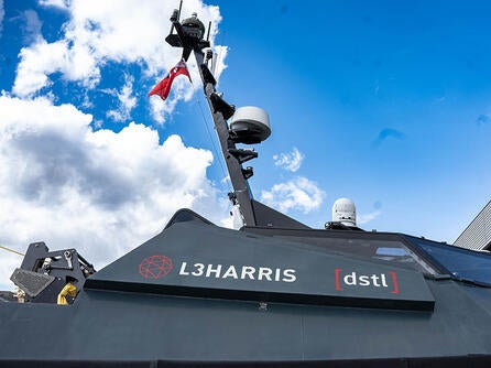 Top of the Defence Science and Technology Laboratory’s MAST-13 uncrewed surface vehicle (USV) where L3Harris' advanced Distributed Spectrum Collaboration and Operations (DiSCO) technology is showcased. Thumbnail image