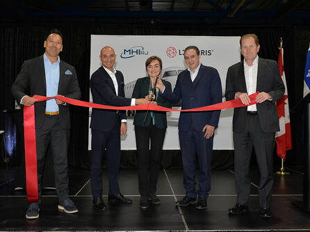 L3Harris and MHI RJ Aviation Group representatives cut ribbon
